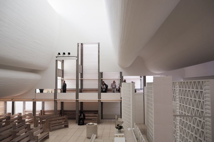 Interior view of Bagsvaerd Church showing soft concrete vaults